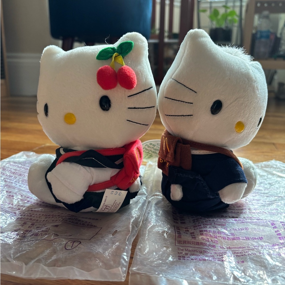 Selling a super cute set of two Hello Kitty plush dolls!